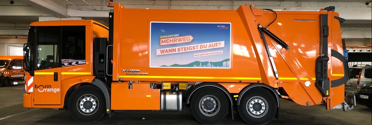Bonn Orange - Flexsign system montiert auf Zoeller und Faun abfallfahrzeuge